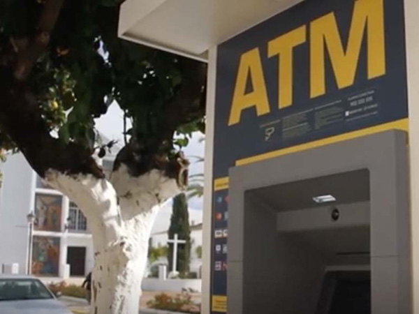 A photo of a Euronet ATM in a rural setting