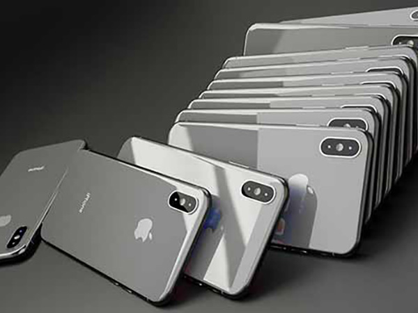 A photo of iPhones stacked next to each other