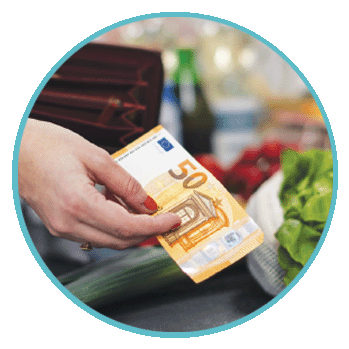 A photo of a person paying with cash at the market