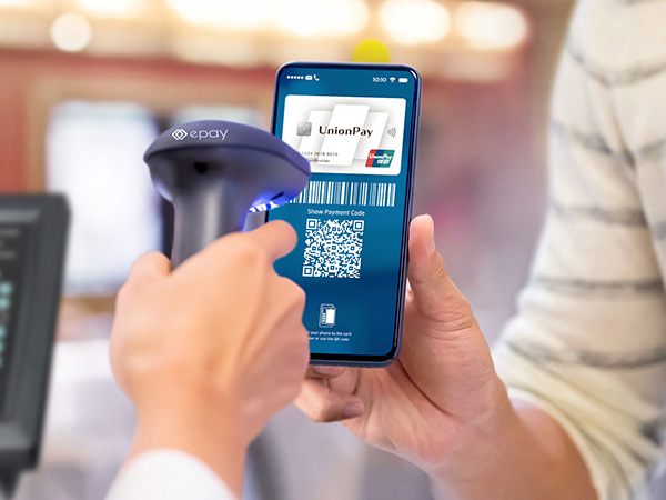 Photo of epay POS scanner and a UnionPay QR code on a smartphone