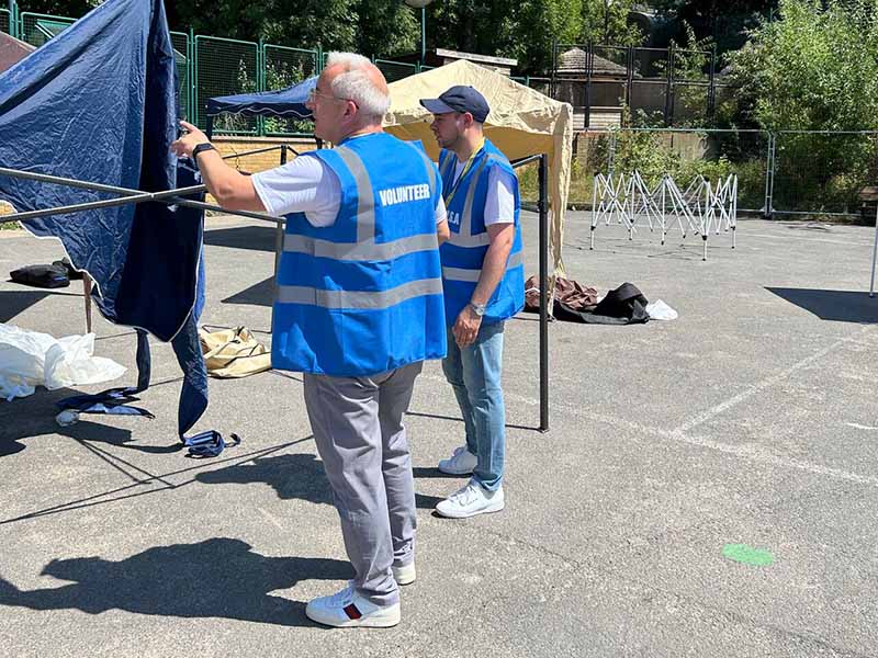 Euronet employees volunteering at King Solomon Academy summer fair in London