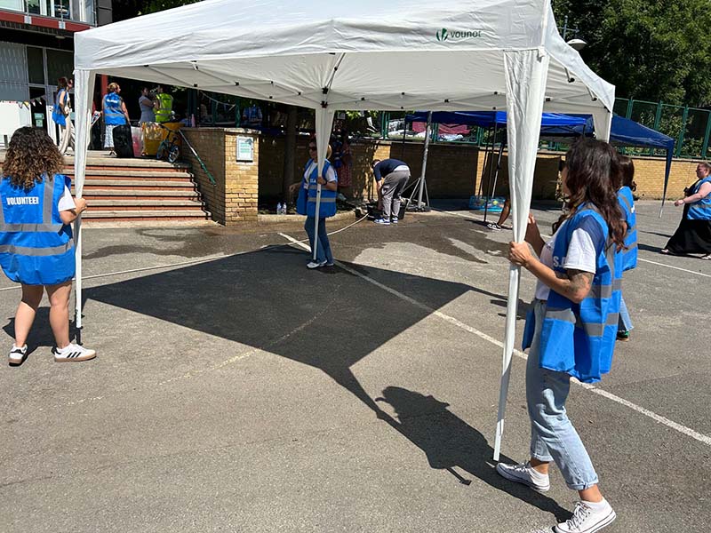 Euronet employees volunteering at King Solomon Academy summer fair in London
