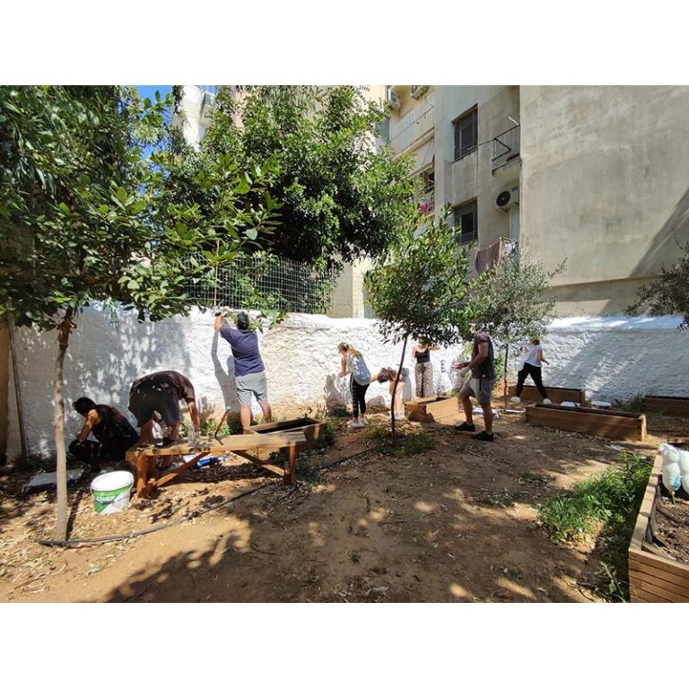 An image of Euronet employees serving at a Day of Caring in Greece