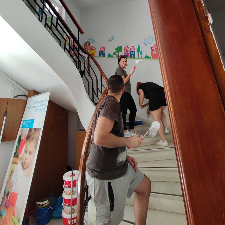 An image of Euronet employees serving at a Day of Caring in Greece