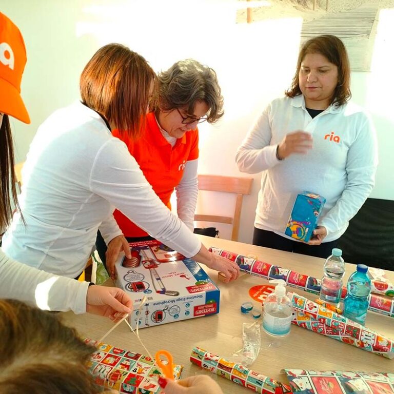 An image of Ria employees serving at Ronald McDonald House in Italy