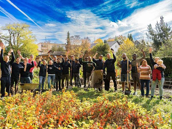 A photo of epay Germany employees donating their time to clean a local park.