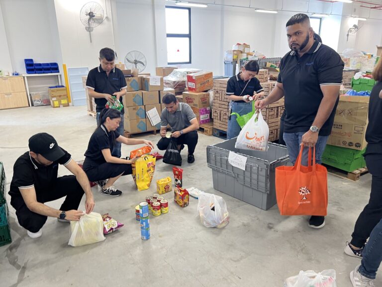 Euronet in Asia donates time at local food bank