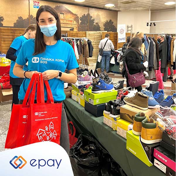 Photo of our epay employees in Greece serving at a local charity